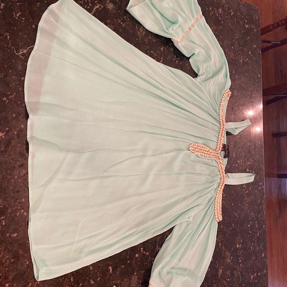 Cold shoulder top with gold and white braiding